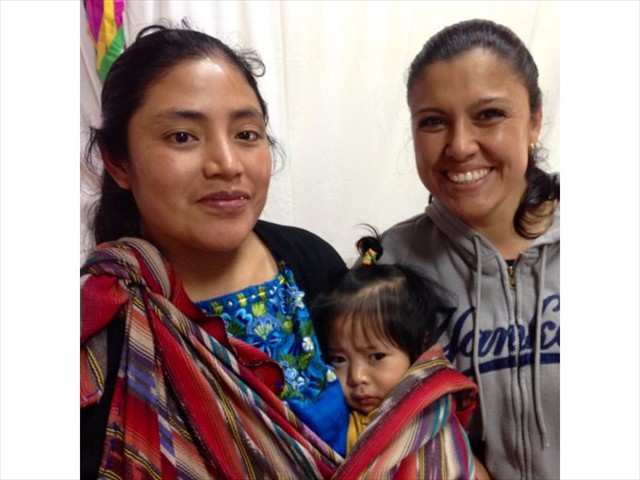 Flor and Mayan Mother and child waiting for their medical exam.