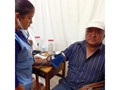 Nurse Volunteer Deana tending to patient at WAY-bi, Guatemala.