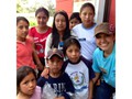 Flor with some of the Mayan children who attended the fiesta.