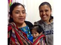 Flor and Mayan Mother and child waiting for their medical exam.