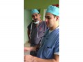 Mission of LOVE Doctors talking to parents after surgery.