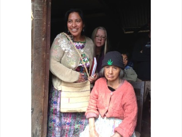 Luana and Paula making a home medical visit to this Mayan elder who had no family to help her.