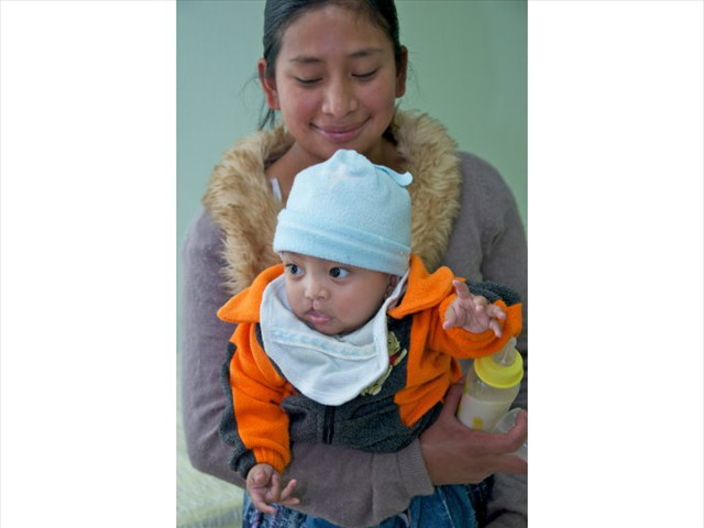 A Mothers LOVE is universal! This Mom was just informed that her child will have the surgery needed.
