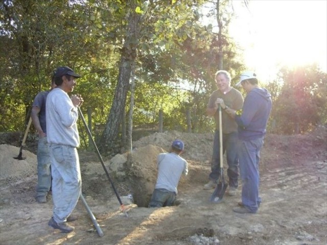 This is how we began the construction of the children 's hospice in Tecpan, Guatemala. Digging by hand holes for the footers. No easy task, but done by many for the same common cause, the Children in need.