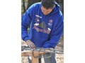 Edwin making by hand rebar that is needed for the cement foundation of the children's hospice,