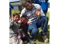 Payson enjoying being with the precious children at the fiesta.