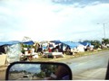 A photo of how many in our world live without homes and only a tarp to call a roof. These are some of the areas in Honduras that received our Denton/Mission of Love Aid.