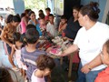 Your donation of children's shoes being distributed.