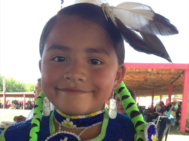 It's all about the children. Beautiful Lakota child dancing at the Pow Wow held in Pine Ridge, S.D