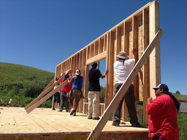 First wall going up for the Camp Home.
