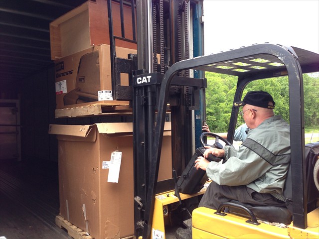 Tom Tadsen volunteering his time to load our Mission of LOVE trailer destined for Pine Ridge Native American Indian Reservation, S.D.