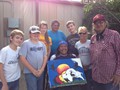 Josephine Standing Soldier, Kevin Poor Bear, Hobart Spotted Bear presenting artwork of Kevin's to the Mission of Love volunteers while on the Pine Ridge Native American Indian Reservation while building a family a Lakota Home. 