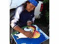 Our friend and artist, Kevin Poor Bear making one of his famous pieces of art for us with the donated art supplies that we brought from Ohio.