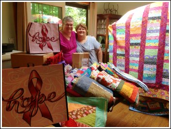 Sue and Kathy packaging the 400 comfort quilts Sue and Kathy packaging the 400 comfort quilts