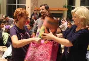 Becky Spratt & Andrea Thome distributing comfort quilts